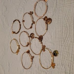 Alex and Ani gold bracelets all with charms